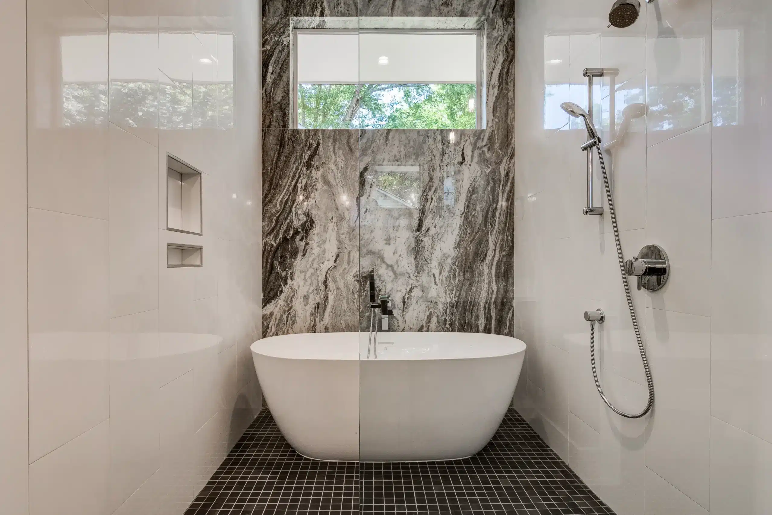Modern kitchen remodel in Asheville featuring custom cabinetry and energy-efficient lighting.