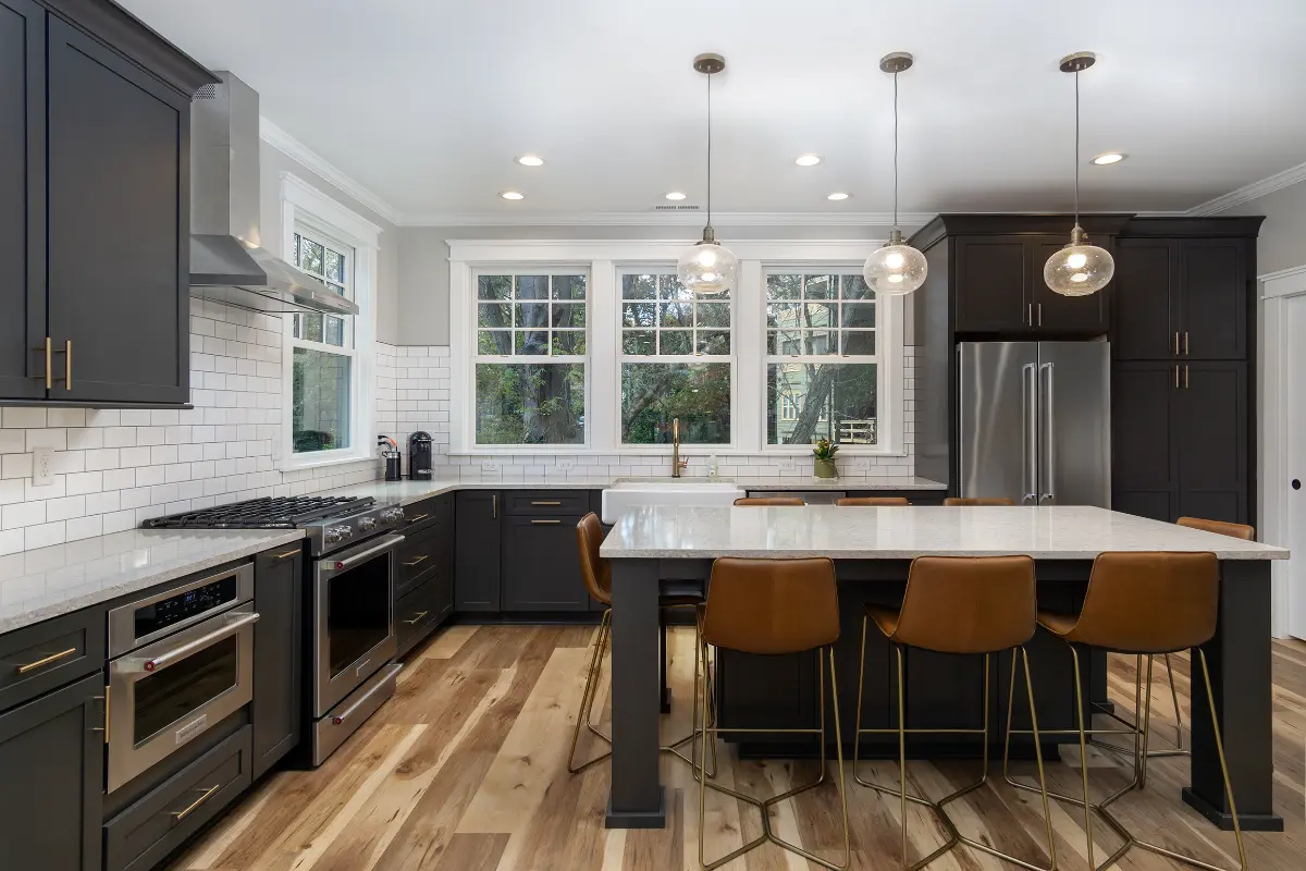 Building services in Asheville NC featuring a modern green built kitchen by Surefoot Builders.